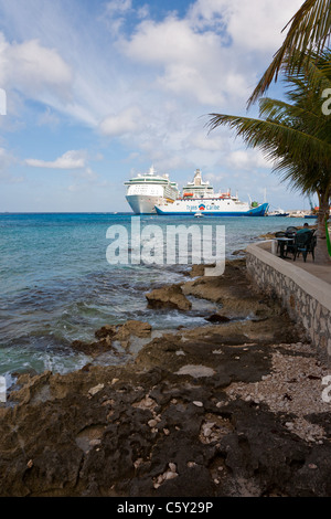 Transcaribe car ferry boat docked in front of cruise ships at port in Cozumel, Mexico in the Caribbean Sea Stock Photo