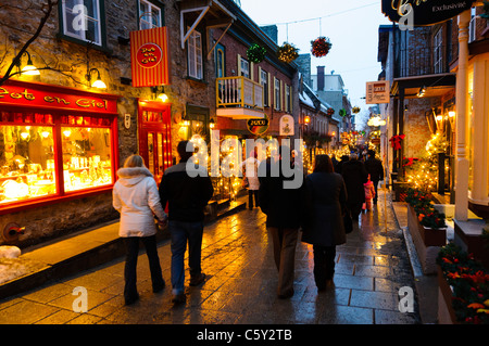 QUEBEC CITY, Canada — The quaint old shopping street of Rue du Petit-Champlain in Quebec City's Old Town, beautifully decorated for Christmas at night. The historic street, lined with festive lights and decorations, offers a magical holiday atmosphere during the winter season. Stock Photo