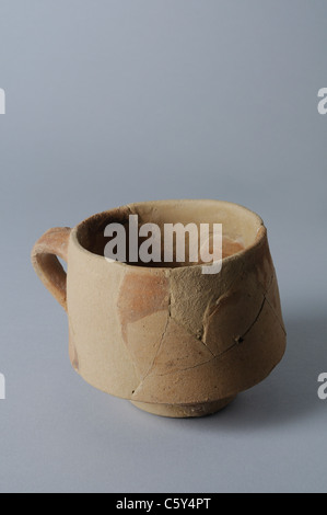 Bisque ceramic cup decorated with iron oxide. Medieval period in  ' Burgo de Santiuste Museum'- SPAIN Stock Photo
