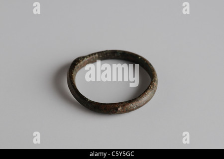 Bronze ring with rounded outer edge. 2.3 x 0.2 cm - Medieval period  in  ' Burgo de Santiuste Museum'- SPAIN Stock Photo