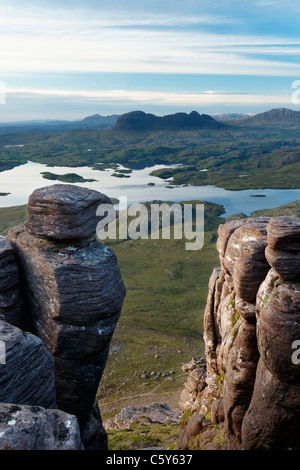 Suilven, viewed from Stac Pollaidh across Loch Scionascaig, Sutherland, Highland, Scotland, UK Stock Photo