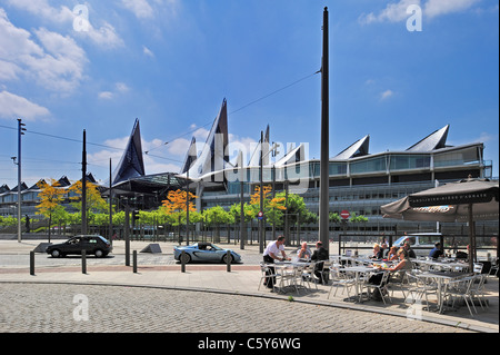 Antwerp Courthouse / New Palace of Justice and tourists sitting on pavement café in summer, Belgium Stock Photo