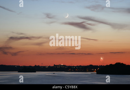 Crescent Moon over Ford Lake on the 4th of July Stock Photo