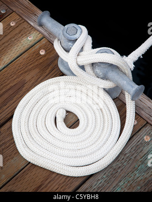 Rope used to tie up a boat to the dock in Roche Harbor, San Juan Island in Washington state, USA Stock Photo