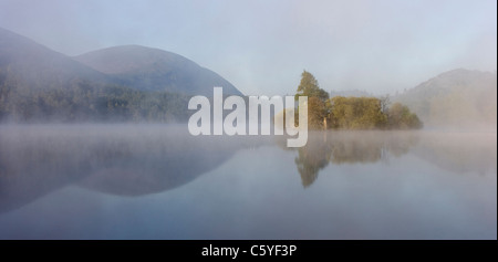 Loch an Eilein on misty morning, Rothiemurchus Forest, Cairngorms National Park, Scotland, Great Britain.