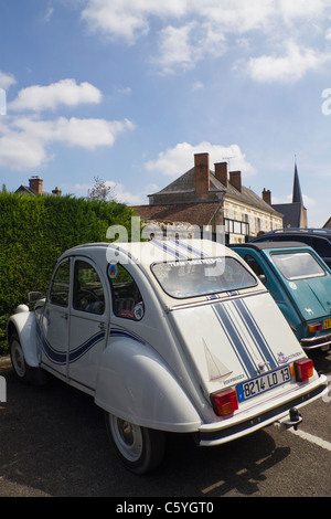 Citroen 2CV deux cheveaux car outside the Chateau de Cheverny, Loire Valley, Touraine, France Stock Photo