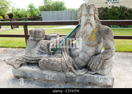 The statue of Old father Thames by Raffaelle Monti beside St John's Lock at Lechlade, Gloucestershire, England UK Stock Photo