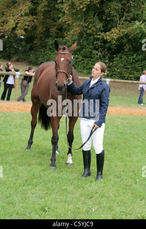 A woman with a horse, french championship saddle horses, Haras du Pin (Orne, Normandy, France). Stock Photo