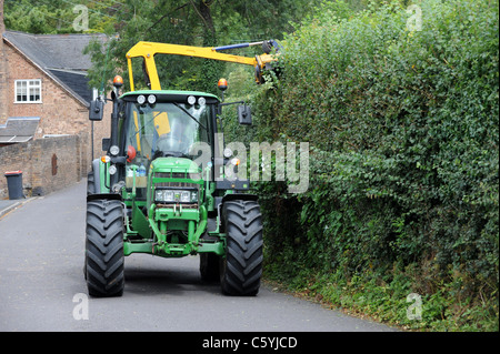 Hedge cutting tractor Stock Photo: 11002155 - Alamy