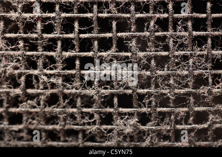 Black Old grungy speaker holes. Texture. Dusty. Stock Photo