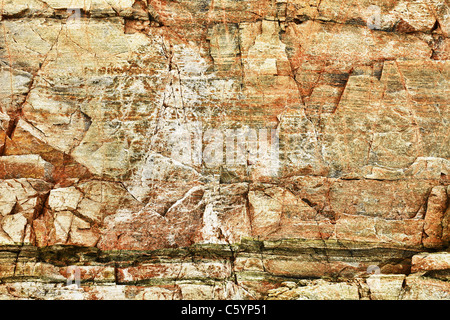 The surface of natural orange stone with spots Stock Photo