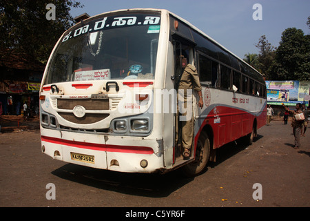 Kerala State Express bus departing from bus station in Kerala India Stock Photo