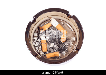 A flithy glass ash-tray, photo on the white background Stock Photo