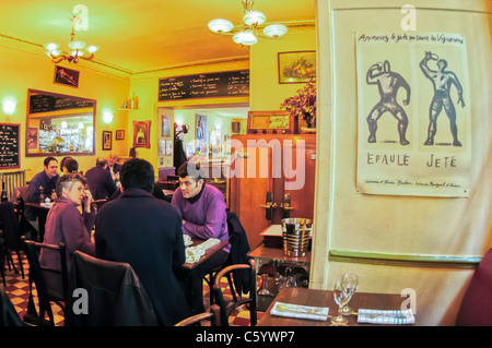 PARIS, France, - people Sharing Meals inside French Bistro Restaurant 'Chez Ramulaud' Stock Photo