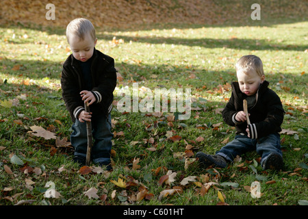 twin boys in the park Stock Photo