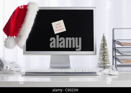 Studio shot of desktop PC with Christmas decorations Stock Photo