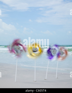 USA, Florida, St. Pete Beach, Row of pinwheels on beach Stock Photo