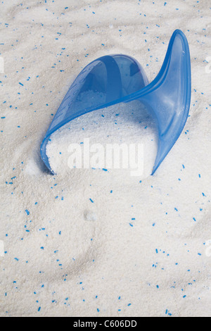 Washing laundry detergent powder and blue plastic measuring cup, top view  Stock Photo - Alamy