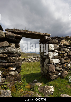 Stone doorway of ruined old croft building, Boreraig, Isle of Skye, Scotland, UK Stock Photo