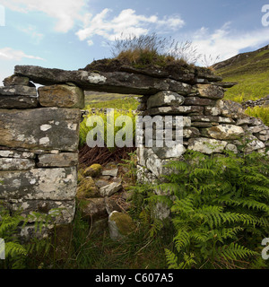 Stone doorway of ruined old croft building, Boreraig, Isle of Skye, Scotland, UK Stock Photo