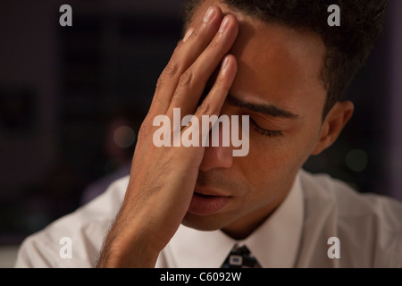 USA, New York City, businessman falling asleep Stock Photo