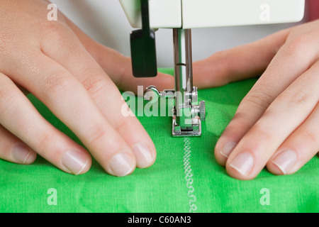 USA, Illinois, Metamora, close-up of woman sewing Stock Photo