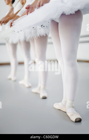 Ballet dancers standing in studio Stock Photo