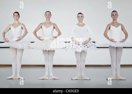 Ballet dancers standing in studio Stock Photo