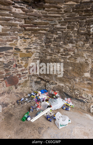 Beer cans and other rubbish collects in a corner of a heritage ...