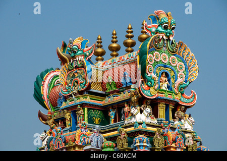 Top section multi coloured gopuram Sri Meenakshi Temple Madurai Tamil Nadu South India Stock Photo