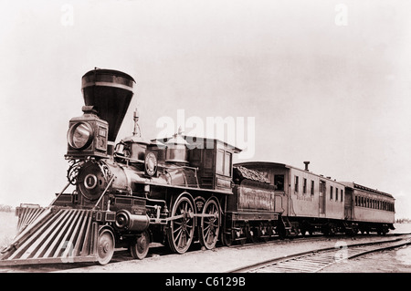 'William Crooks' a 1861 locomotive of the Great Northern Railway with tender and cars. The tender is a special car to carry fuel and water to keep the locomotive running. Stock Photo