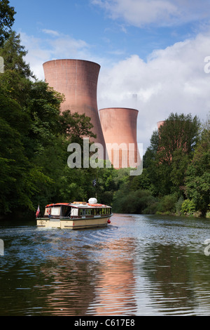 A boat on the River Severn near Buildwas Power Station, Shropshire, England, UK Stock Photo