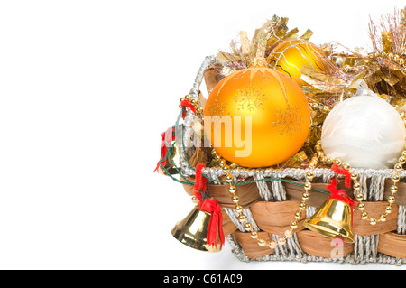 New Year's decoration in a wooden basket with hand bells Stock Photo