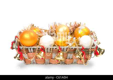 New Year's decoration in a wooden basket with hand bells Stock Photo