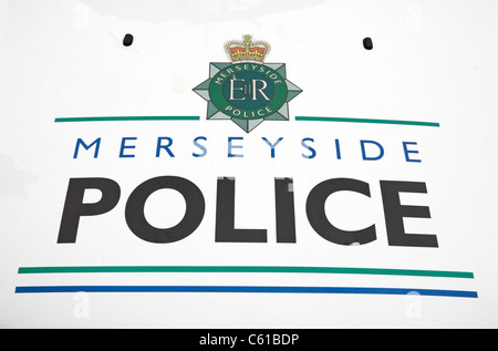 The Merseyside Police coat of arms on the bonnet of a patrol car in Liverpool, August 2011. Stock Photo