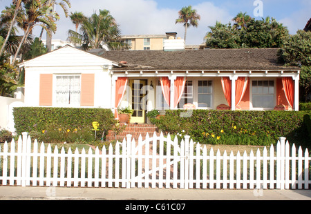 California Bungalow with a front porch and white picket fence in La Jolla Stock Photo