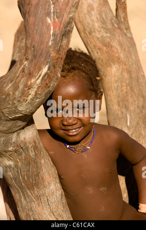 A young boy of the Himba tribe. Purros, Northern Kaokoland, Kaokoveld, Namibia. Stock Photo