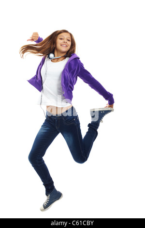 Cute girl in casual clothes jumping in isolation Stock Photo