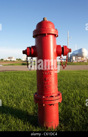 red darling valve fire hydrant in rural michigan north dakota usa Stock Photo