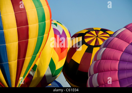 Several hot-air balloons being inflated Stock Photo