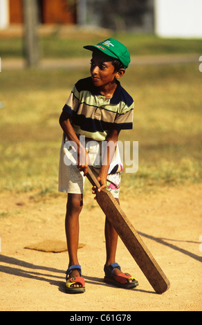 Young boy playing cricket. Galle, Sri Lanka Stock Photo