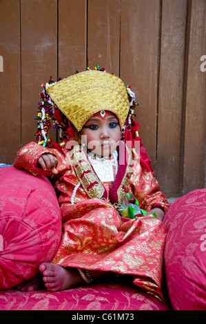 The Kumari of Sankhu, girl worshiped as the living reincarnation of the God Durga. For Hindus she is a living God. Stock Photo