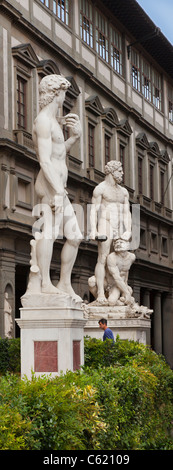 Michelangelo's Statue of David and Bartolommeo Bandinelli's Hercules and Cacus, Piazza della Signoria, Florence, Italy Stock Photo