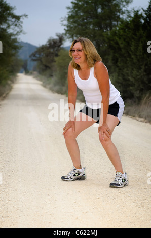 Mature woman at fitness exercise Stock Photo