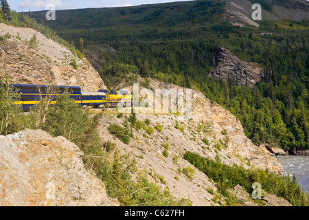 Alaskan Railroad train running alongside the Nenana River in Alaska. Stock Photo