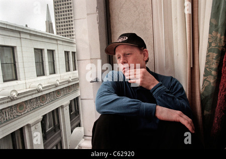 Film director Ron Howard looks out his hotel window in San Francisco. Stock Photo