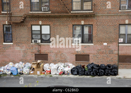 Garbage to be picked up on East Broadway on the Lower East Side in New ...