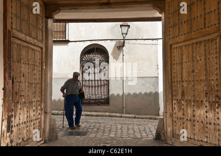 Entrance to a courtyard with decorative wooden doors, in the little town of Chinchon, New Castille, Spain Stock Photo