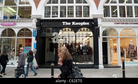 Pedestrians on New Bond Street walking past French boutique The Kooples in London  KATHY DEWITT Stock Photo