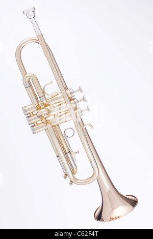 A professional gold trumpet isolated against a white background. Stock Photo